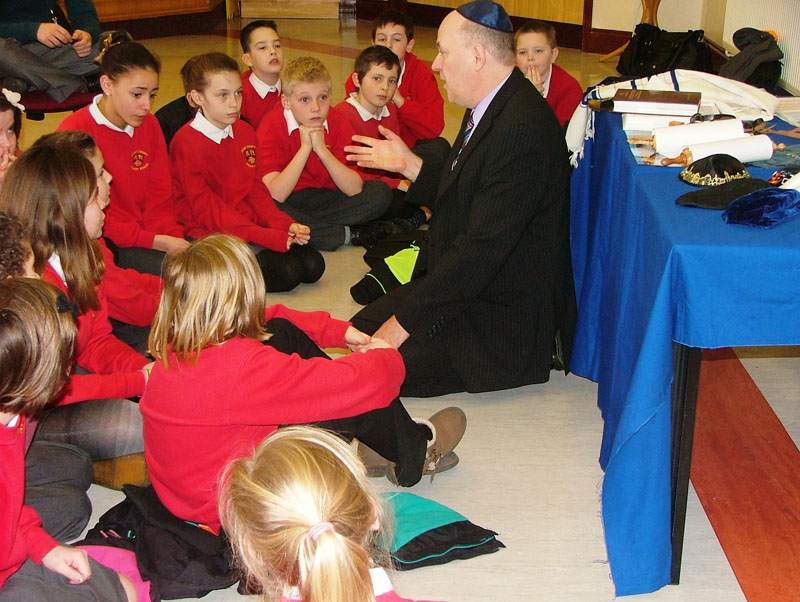 Attentive pupils from Rogiet Primary School listen to the Jewish faith representative