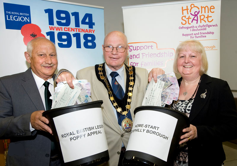 Mayor of Caerphilly county borough Cllr David Carter pictured with the Royal British Legion’s Ken Terry and Gillian Jervis of Home-Start Caerphilly Borough