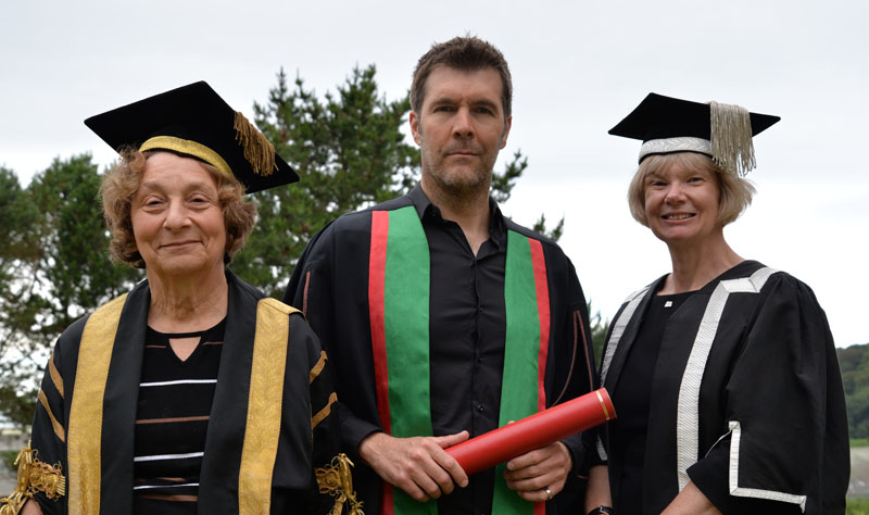 Elizabeth France, Vice-President of Aberystwyth University, Rhod Gilbert and Professor April McMahon, Vice-Chancellor of Aberystwyth University
