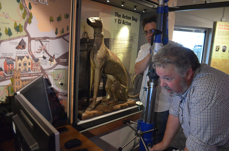 Olivier Durieux (left) with Arfon Hughes (front) start work on scanning the Acton Dog at Wrexham Museum 