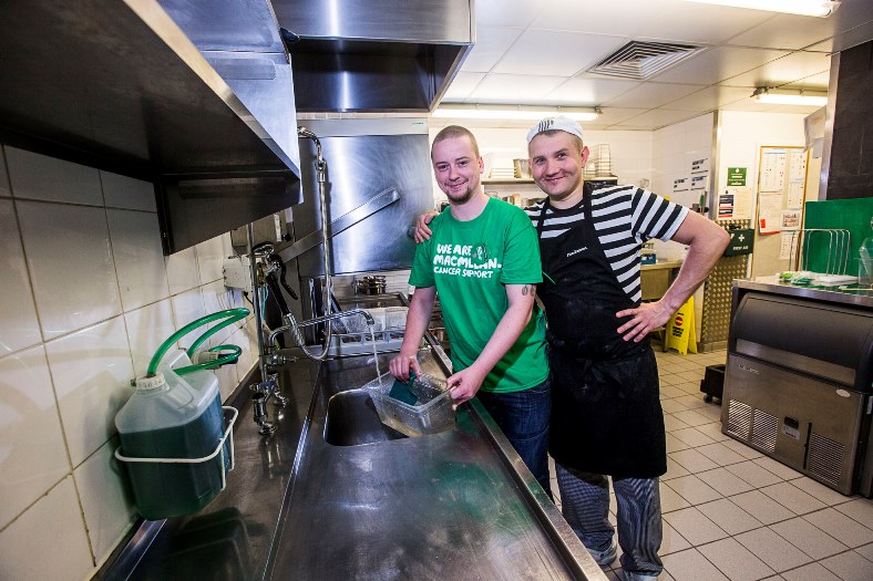 Pizza Express at Eagles Meadow, Wrexham are raising funds for MacMillan and pot washer Michael Evans is walking up the big roller-coaster in Blackpool in aid of the charity. Michael is pictured with chef Michal Ciesla, right.