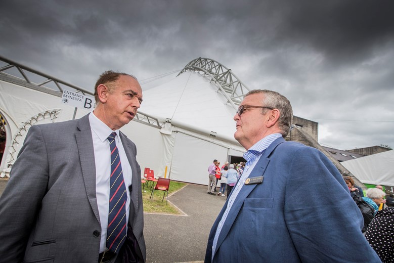 Llangollen International Musical Eisteddfod 2016. Welsh Office Minister Lord Bourne with Rhys Davies, chairman of the Eisteddfod