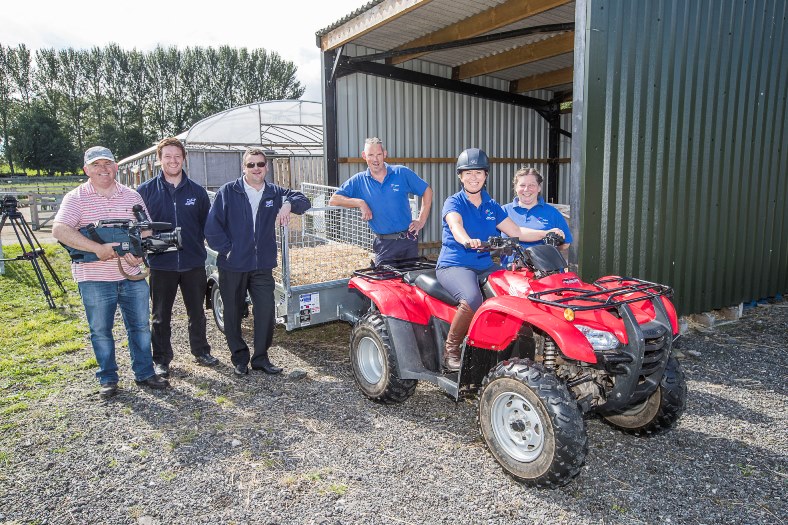 Ifor Williams Trailers, filming for Ffermio. Cameraman Gareth Vaughan Jones with the 'cast', from left, Steffan Parry, Andy Price, Pete Evans, Kate Jones and Wendy Gacem.