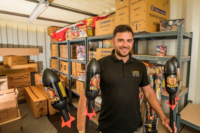Lock Stock's  fireworks sales are rocketing and Liam Baker is pictured wth some of the stock.