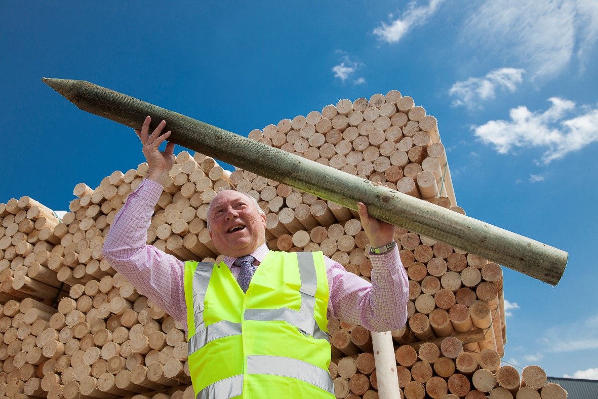 Clifford Jones Timber in Ruthin .pictured is Keith Corbett with the fence post.
