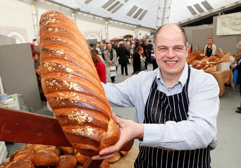 Hamper Llangollen. Pictured: Robert Didier from Orchard Pigs Bakery with a world record bread selling for £75