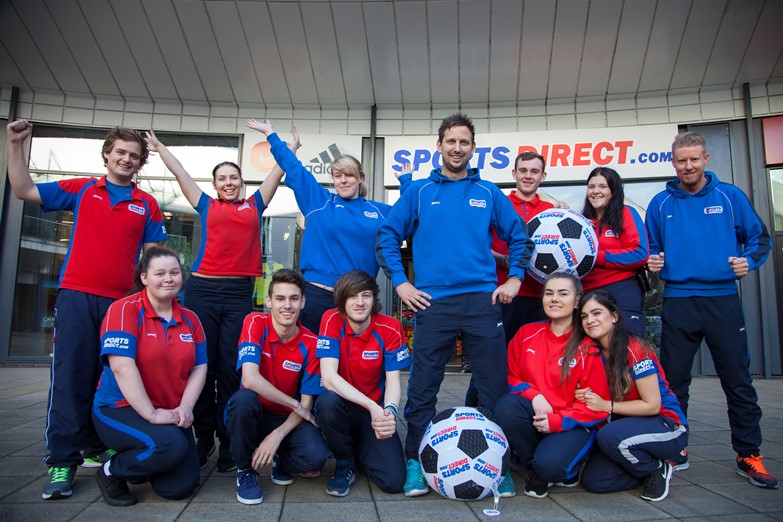 EAGLES MEADOW WREXHAM...Pictured is Area Manager Chris Bellingham with the Sports Direct staff  at Eagles Meadow.