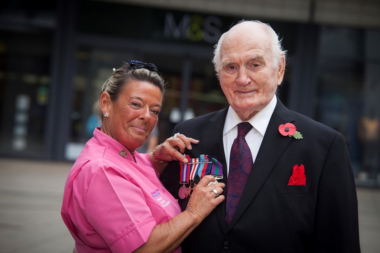 Bill Evans, a Pendine Park resident and Veteran  who is helping promote this year's Poppy Appeal.  Pictured is Bill  Evans with  senior care practioner Mandy Williams.
