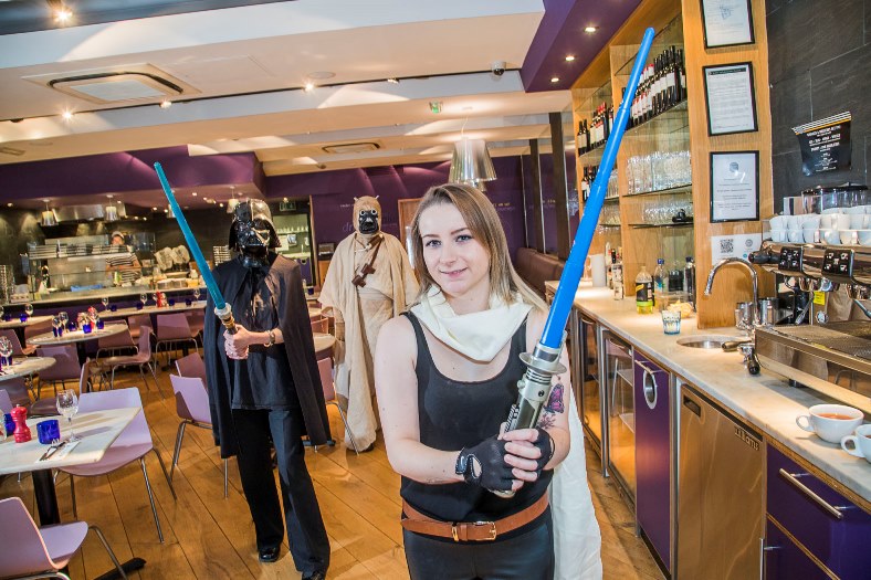 Pizza Express. staff in costume, in aid of Macmillan cancer charity, to coincide with launch next week of the new Star Wars film. From left, Celine Larnicol, Robert Williams-Day and Ceri Jones.