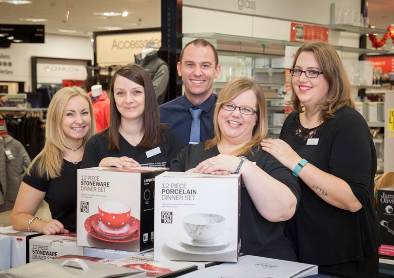 Debenhams at Eagles Meadow in Wrexham have employed workers from BHS. Pictured: Two of the new recruits Sharon Jones and Claire Littler are welcomed to their new jobs by Debenhams staff Siobhan Clifton, Manager Chris Gilston and Gemma Lyons