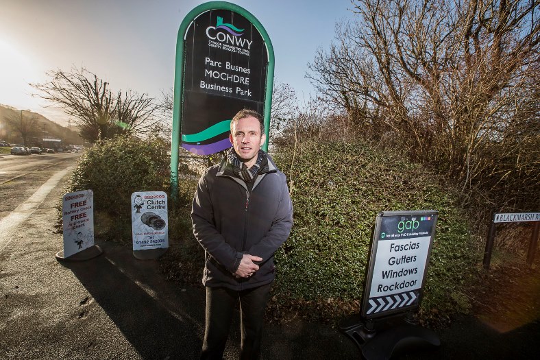 Mochdre Business Park cmapign for new signs for the area's business parks. Syd Gaskins, who is the prime mover for the campaign is pictured.