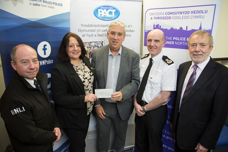 Pictured at the Your Community Your Choice awards are, from left, Gwynedd winners the Barmouth Lifeboat, from left, Martin Sampson and Jacquie Forster, with North Wales Police and Crime Commissioner Arfon Jones, Deputy Chief Constable Gareth Pritchard and David Williams, chairman of the Police and Community Trust.