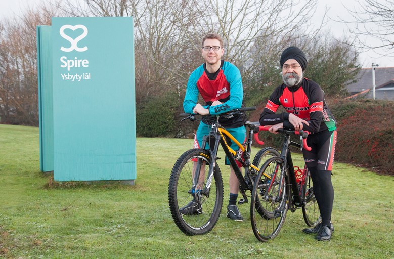 Spire Yale patient Matthew Booth is delighted with the excellent care and treatment he had at Spire Yale in Wrexham from Consultant Mr Raminder Singh who is also a keen cyclist and a member of Wrexham Cycling Club. Pictured: Matthew Booth and Mr Raminder Singh