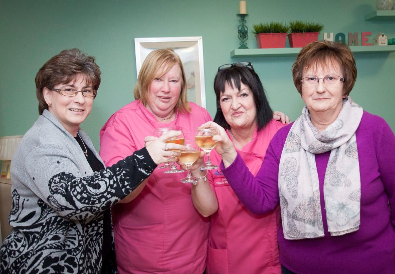 Pendine's Hilbury Care Home in Wrexham say a fond farewell to Joan Price who retires after 40 years service. Pictured: Joan Price celebrates with a glass of bubbly along with Cindy Clutton, Janet Clayton and Ann Edwards