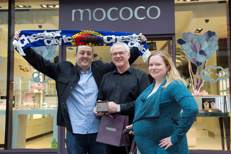 Pictured at Eagles Meadow Wrexham are competition winners   Richard Baker and Louise Andrews from Connah’s Quay with Manager of Mococo Russell Hooson (CENTRE)