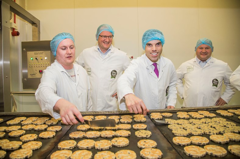 Ken Skates AM visited Village Bakery on Wrexham Industrial Estate. Pictured with Robin and Christian Jones and Anthony Dougherty on the Welsh Cakes production line