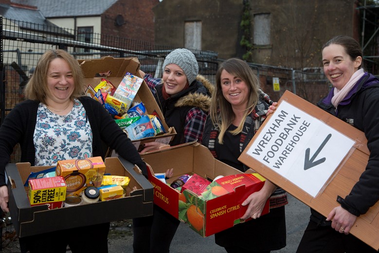 Pendine Park Smartcare Staff donate  food parcels and other goodies to Sally Ellison at the foodbank centre, Wrexham.... Pictured (from Left) are Rebecca Griffiths, Sarah Morse and Kelly Humphreys with Sally Ellison from Wrexham foodbank.