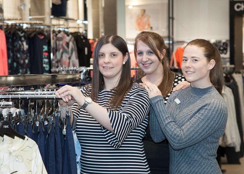 Staff in NEXT at Eagles Meadow in Wrexham. Pictured in store are: Laura Jones - Women's Wear Co-Ordinator, Store Manager Caroline Collinson and Deputy Manager Sarah Young