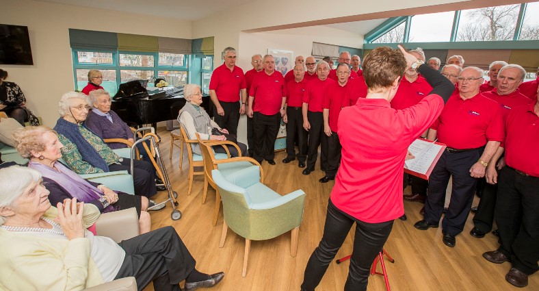 Caernarfon Male Voice Choir who are being sponsored by Pendine Park gave a concert for residents and family at Bryn Seiont with conductor Delyth Humphreys