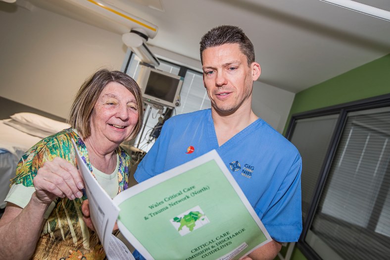 Carol Cooper, who was treated in the Intensive Care Unit at Glan Clwyd Hospital unit for heart problems visits the unit and meets Rhys Tudur, a cardiac specialist nurse, who helped look after her and looks through the new new critical care guidelines.