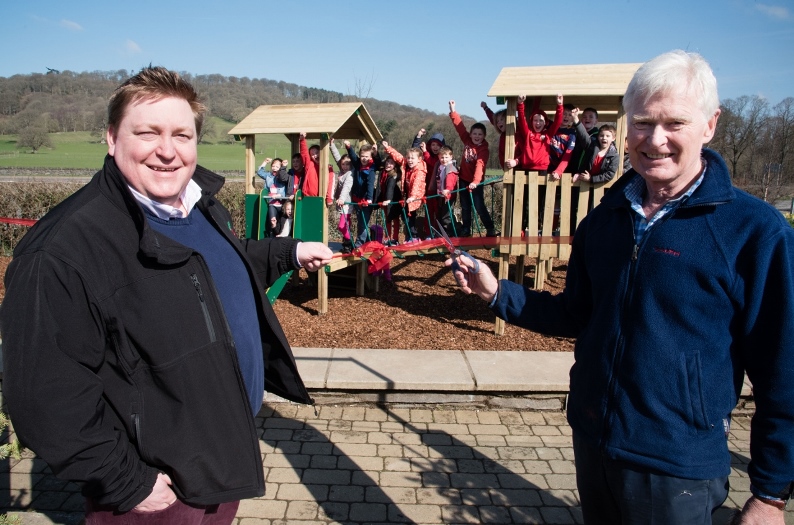 David Esser, Creative Play Sales Director and Lord Newborough officially open the new play area at the Rhug Estate, Corwen.