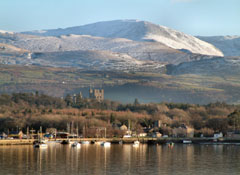 Porth Penrhyn and the tower of Penrhyn Castle