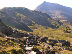 Two walkers on the PYG Track about to enter the boulder field. 