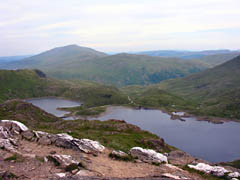 Llyn Llydaw, the Miners Track and the causeway over Llydaw from the PYG Track. 