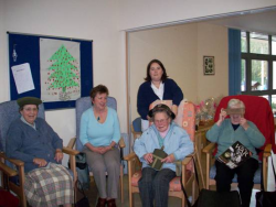 Pictured are (seated, left to right) Irene Burnley, Sue Baldwin, Gladys Evans, and Hilda Barlow with (standing) Care Assistant Joanne Woodhead
