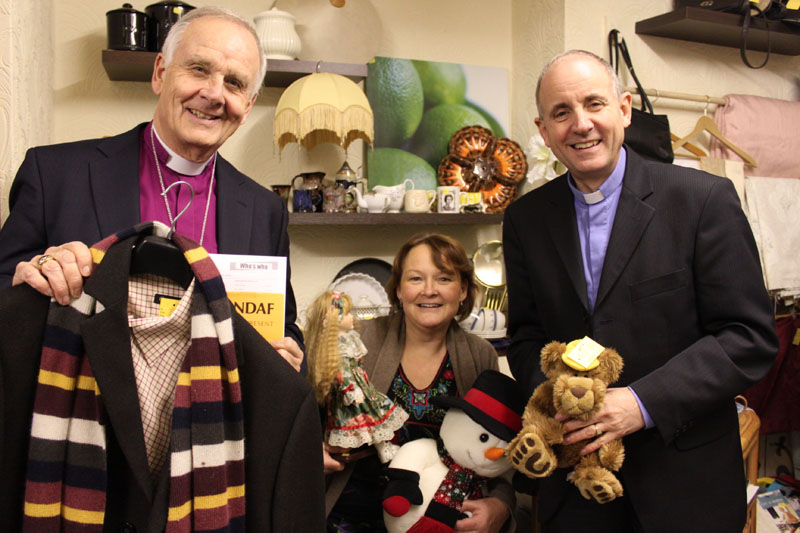 (l-r) Archbishop Barry Morgan, shop manager Karen Homans and Revd Christ Gray