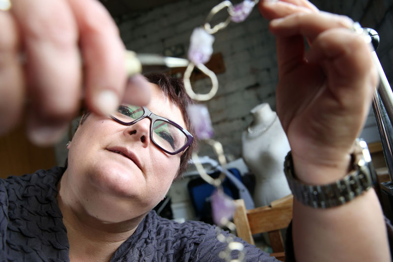 Karen Dell'armi at work designing jewellery for her collections.