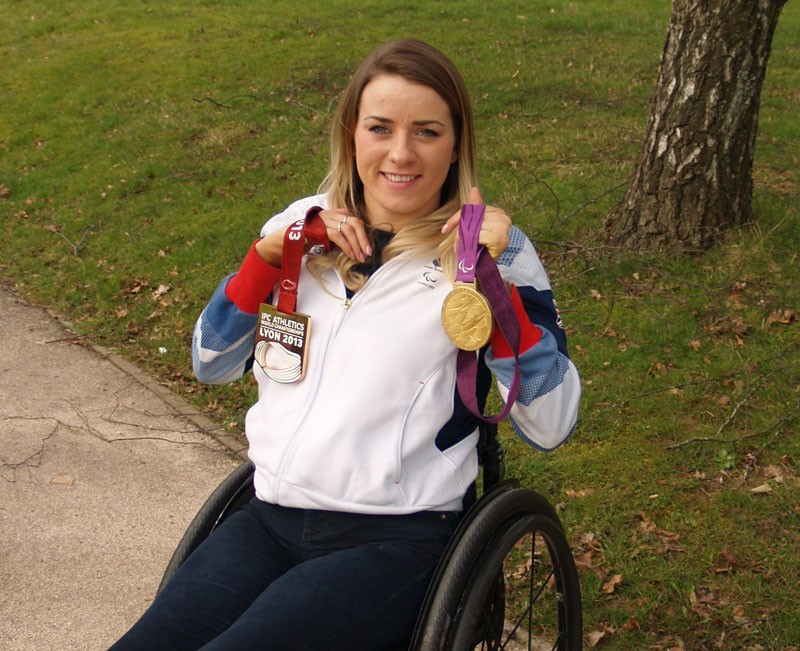 Josie Pearson with London 2012 gold  (discus) and Lyon 2013 IPC Athletics World Champions medals