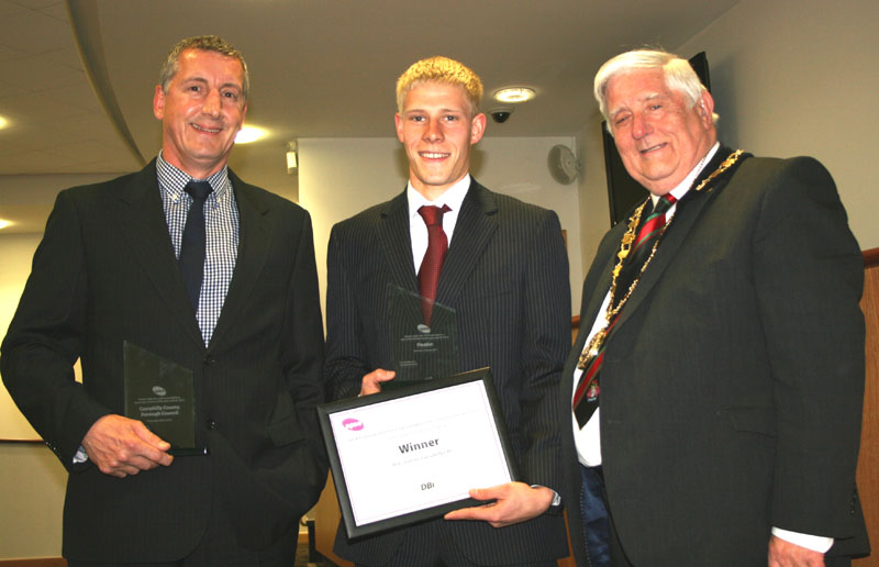 Highways Maintenance Manager Gareth Richards and Highways Operative Michael Davies receive their awards from Mayor of Caerphilly county borough Cllr Michael Gray