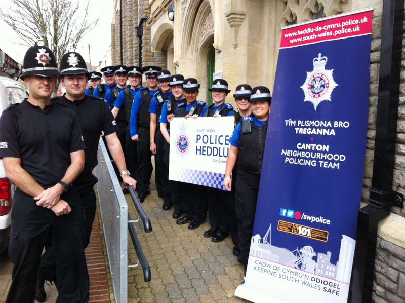 Members of the Canton Neighbourhood Policing Team including 11 PCSOS with Acting Sergeant Gerallt Hughes and PC Brett Coates