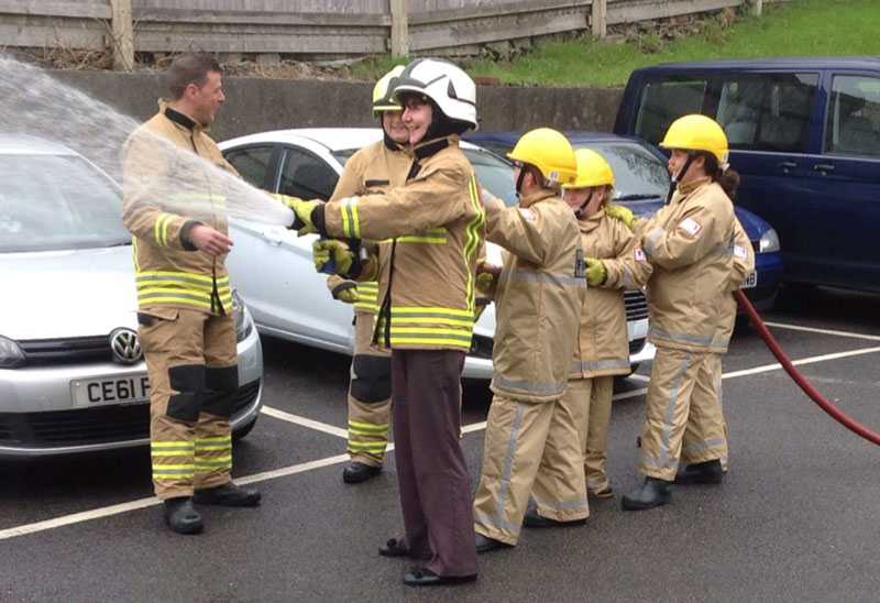 Lesley Griffiths joins young people on the Bernie project’s Firefighter for a day course at Maesteg Fire Station