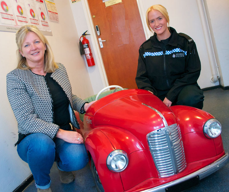 Kate Marment (left) with Pc Myfanwy Beaumont, and the Austin J40 on the day it was handed over at Merthyr Police station