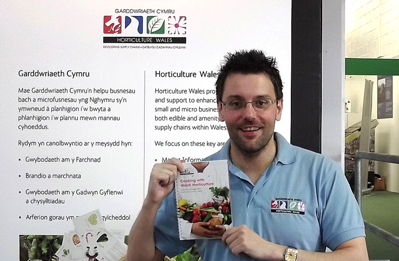 Chris Owens, Communications Officer for Horticulture Wales, with the original 'Cooking with Welsh Horticulture' recipe book