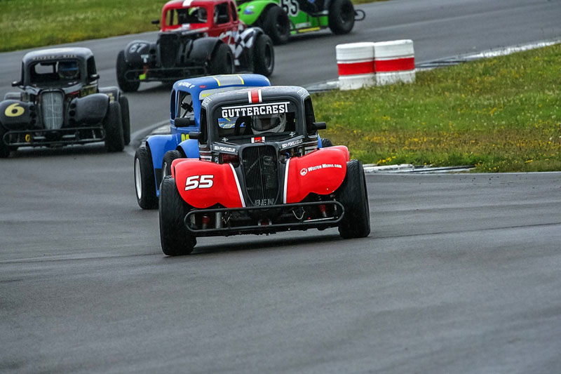 Ben Power in action in the Guttercrest Racing Legends Car (No 55) at Anglesey. Photo by Rodney Tietjen