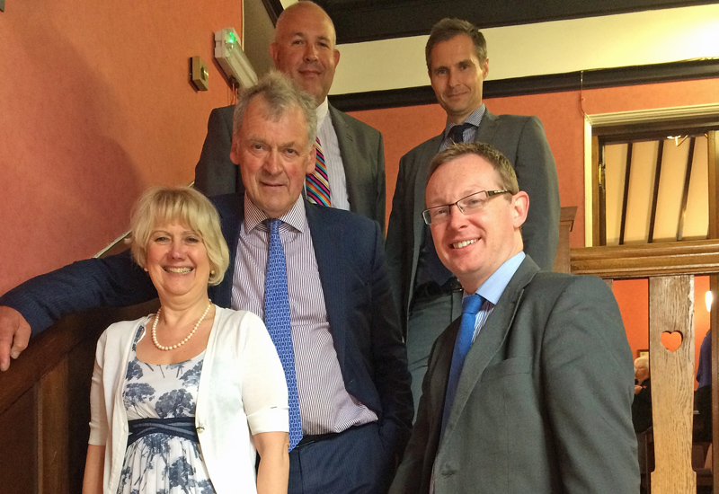 Russell George AM (front, right) with Ann Beynon (front, left), BT Director Wales and Glyn Davies MP (middle, left) along with representatives of BT