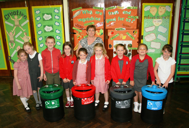 Mrs Carol Cooke pictured with members of the school’s Eco Committee and Junior Road Safety Committee