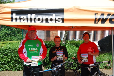 PC Paul Evans and PC Sam Beaumont, with Halfords Deputy Manager Danielle Evans