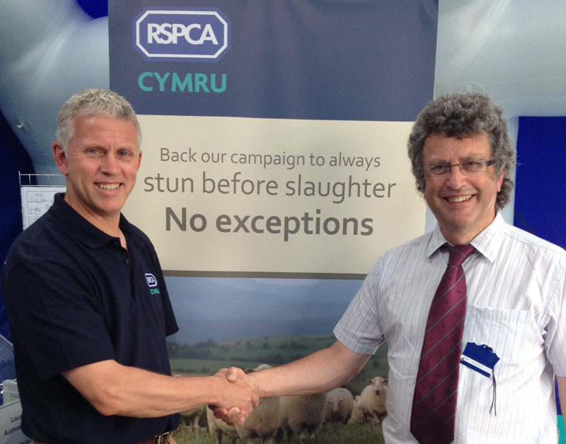  Picture caption: (Left to right) RSPCA Cymru's Steve Carter with Rob Davies, President of the BVA Welsh Branch at RSPCA Cymru’s stand at the Royal Welsh