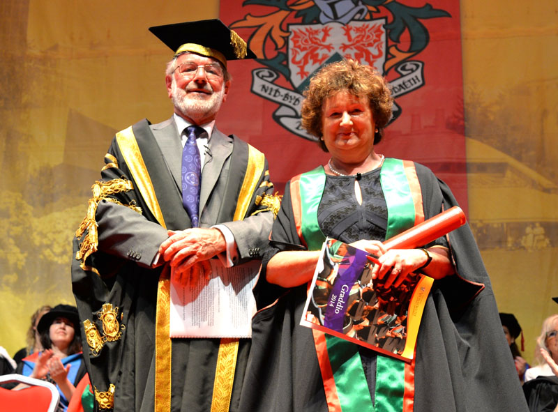 Vice President of Aberystwyth University, Dr Glyn Rowlands, presenting Baroness Kay Andrews as Fellow of Aberystwyth University