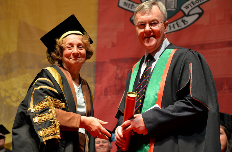 Aberystwyth University Vice-President, Elizabeth France, presents Professor John Harries as Fellow of Aberystwyth University