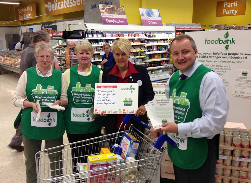 Clwyd West AM Darren Millar with volunteers at the Foodbank at Abergele Tesco