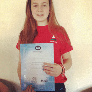 Elan Môn Gilford with her 50 hour MV certificate