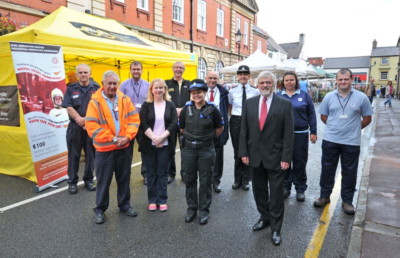 Members of the Flintshire Community Safety Partnership outside the stall at Mold market