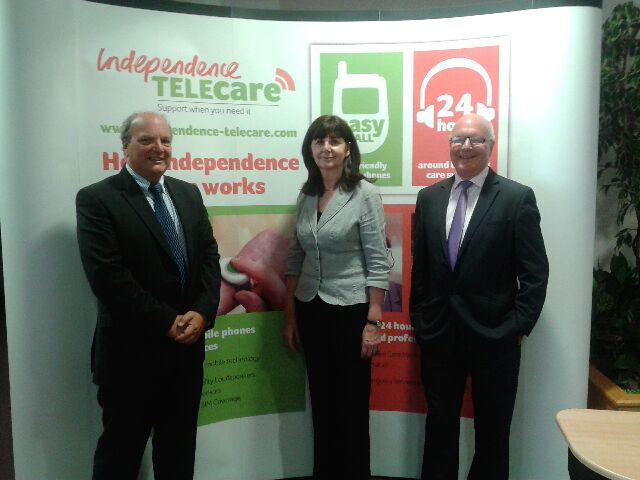 Lesley Griffiths AM alongside Independence Telecare Chairman Malcolm Barnett and Managing Director Nigel Burns