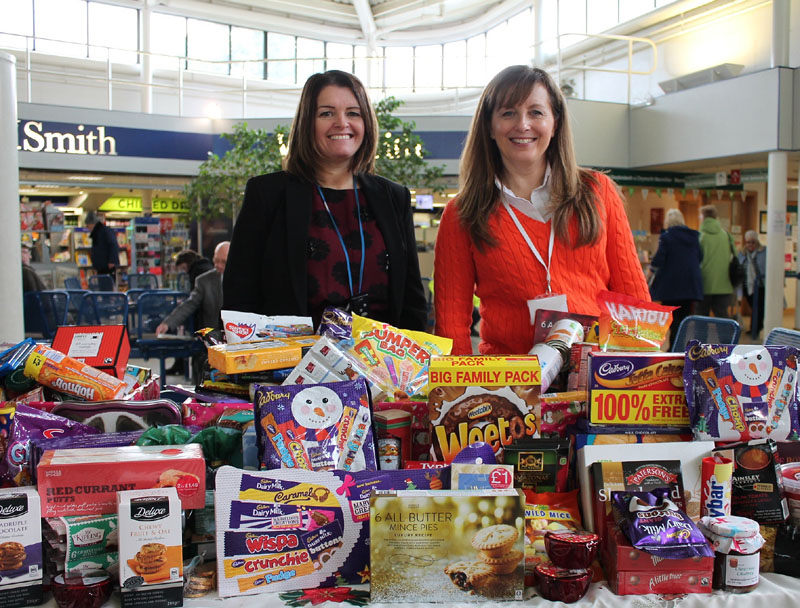 Michelle Fowler and Tracey Skyrme in the concourse at UHW with the foodbank collection in December