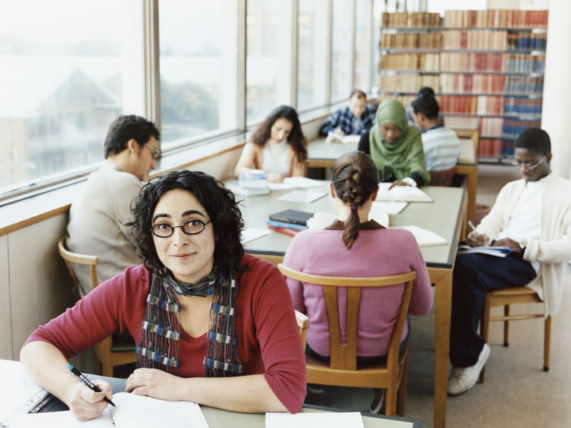Mature Students Studying in a University Library